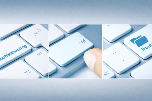 Closeup of white computer keyboard with troubleshooting, control, and folder keys highlighted.