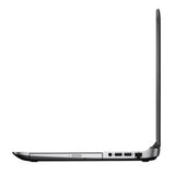 Slim silver laptop side view with open screen, showing ports and thin design