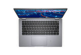 Top view of an open Dell laptop with black keyboard and abstract screen pattern