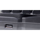 Close-up of a black computer keyboard with a visible USB port