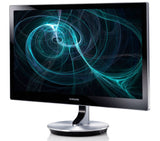 Samsung LED monitor with black bezel and modern stand displaying abstract blue graphics