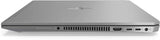 Silver laptop closed, showing side ports including USB, HDMI, SD card slot, and headphone jack.
