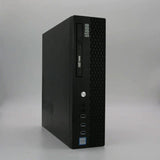 Refurbished small form factor desktop PC with front USB ports and DVD drive on grey background