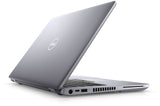 Silver Dell laptop partially open, angled view showing side ports and keyboard