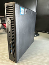 HP EliteDesk mini desktop PC with Intel Core i5, front USB ports on a desk