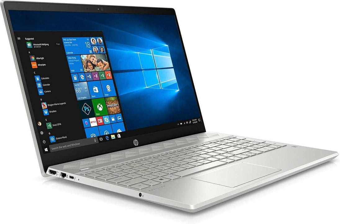 Silver HP Pavilion laptop with Windows 10 home screen, angled on white background