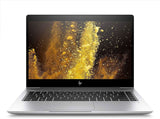 Silver HP laptop with black keyboard, vibrant yellow abstract display, front view