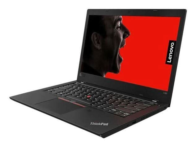 Lenovo ThinkPad laptop L580 with a side profile of a man shouting on a red screen