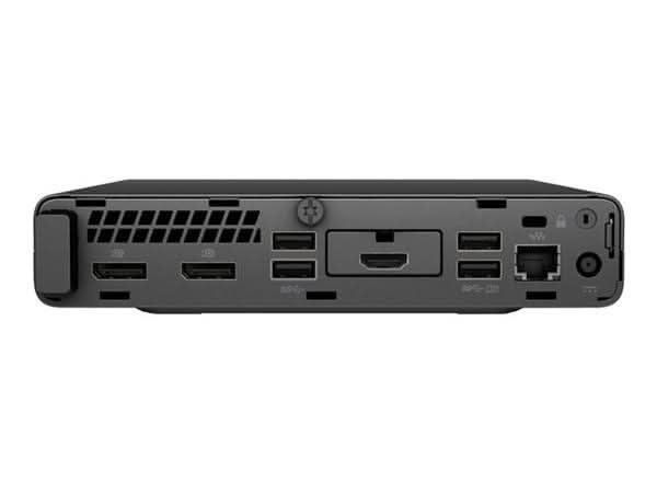 Back view of a compact desktop computer showing HDMI, USB, Ethernet, and DisplayPort ports.