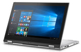 Convertible laptop in tent mode running Windows 10, displaying start menu on screen.