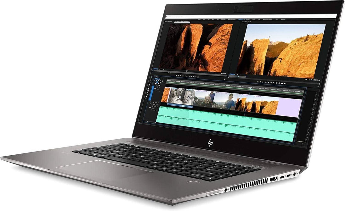 Refurbished HP laptop with video editing software displayed on screen, angled view