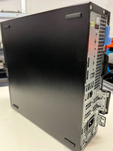 Refurbished desktop tower PC with visible rear ports and ventilation, placed on a desk