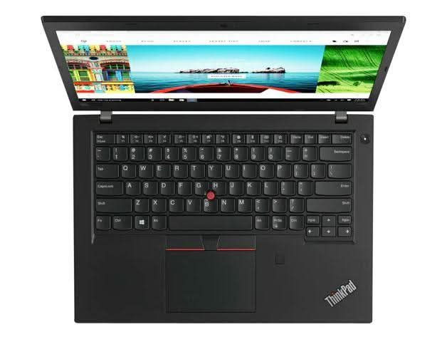 Open black Lenovo ThinkPad laptop with full keyboard and display, viewed from above