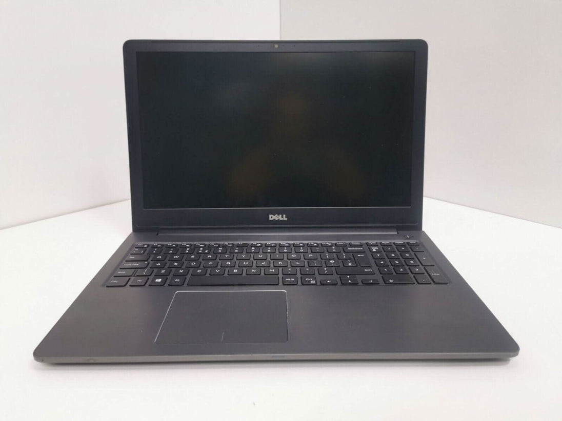 Front view of a Dell laptop with black keyboard and screen, on a white background
