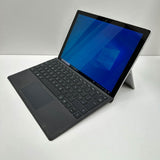 Refurbished Microsoft Surface tablet with keyboard, Windows 10 screen, kickstand open