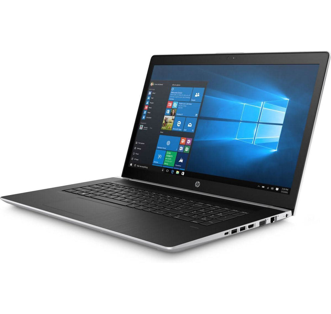 HP laptop with Windows 10 open, black keyboard, silver body, side ports visible