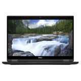 Dell laptop displaying a vivid waterfall and forest on screen, front view