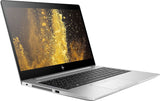 Silver HP laptop with black keyboard and vibrant gold splash on screen, angled left