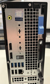 Rear view of a refurbished desktop computer with USB ports, Ethernet port, and ventilation grid