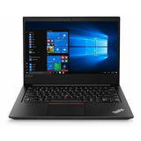 Lenovo ThinkPad laptop with Windows 10 desktop, black keyboard, and widescreen display