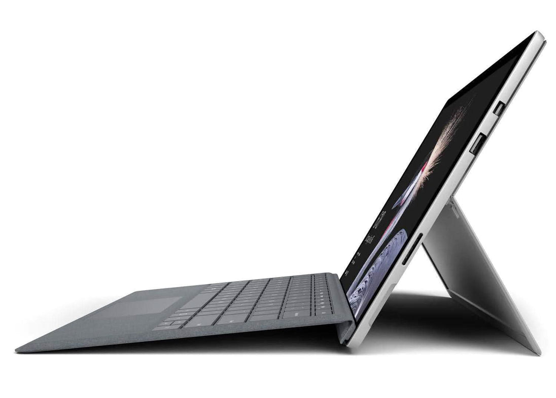 Side view of a 2-in-1 laptop tablet with keyboard, kickstand, and slim modern design